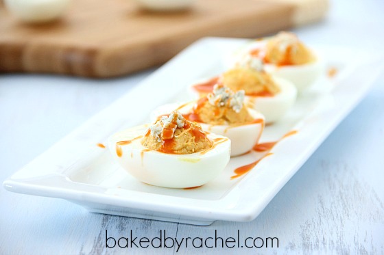 Buffalo Chicken Deviled Eggs Recipe from bakedbyrachel.com