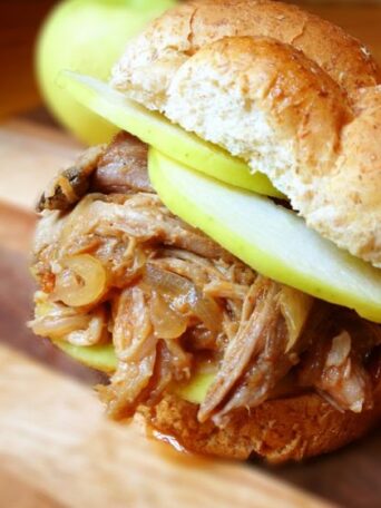 Slow Cooker Pulled Pork with Apples and Onions Recipe by The Lemon Bowl on bakedbyrachel.com
