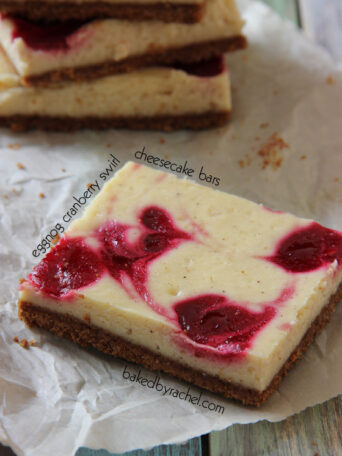 Eggnog Cranberry Swirl Cheesecake Bar Recipe from bakedbyrachel.com