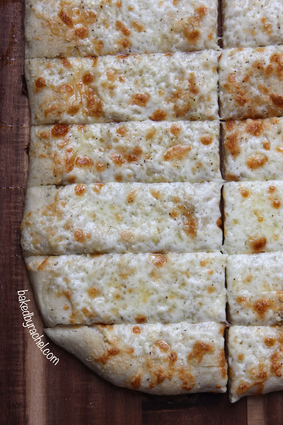Cheesy Garlic Pizza Bread Sticks Recipe from bakedbyrachel.com