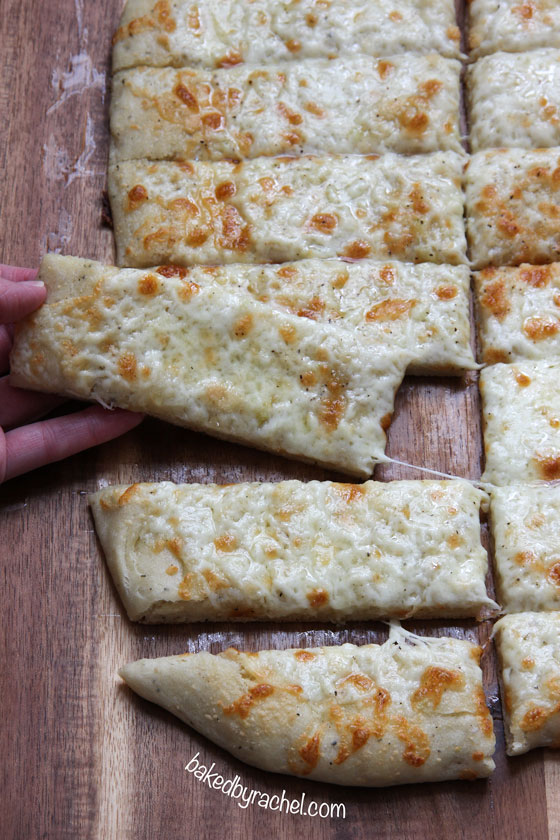 Cheesy Garlic Pizza Bread Sticks Recipe from bakedbyrachel.com