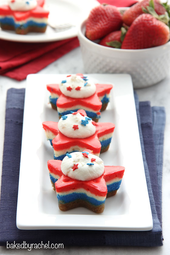 Mini red, white and blue layered star cheesecakes. A fun patriotic dessert recipe from @bakedbyrachel, perfect for the 4th of July!