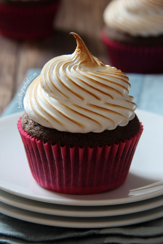 Chocolate s'more cupcakes with homemade marshmallow frosting. Recipe from @bakedbyrachel