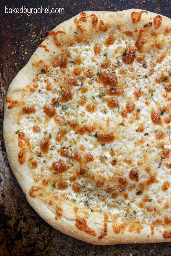 Homemade thin crust two-cheese white pizza. Recipe from @bakedbyrachel 