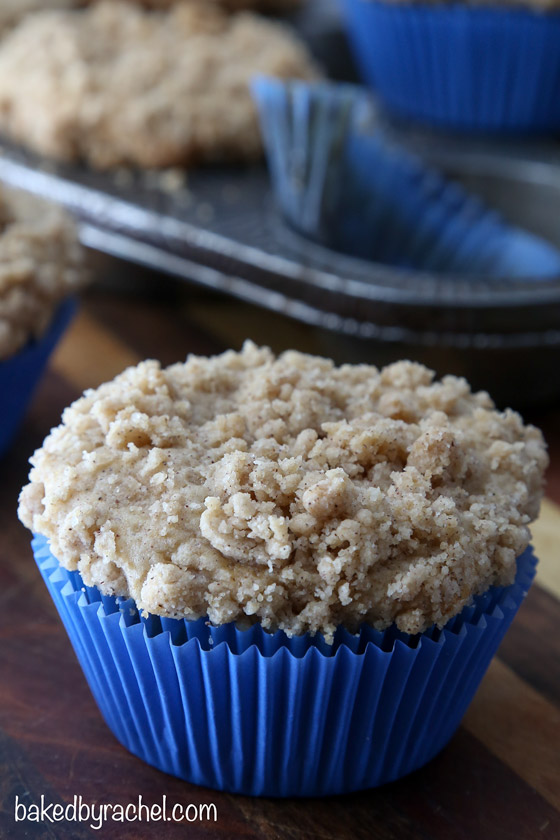 Moist sour cream coffee cake muffins with a crunchy streusel topping. Recipe from @bakedbyrachel