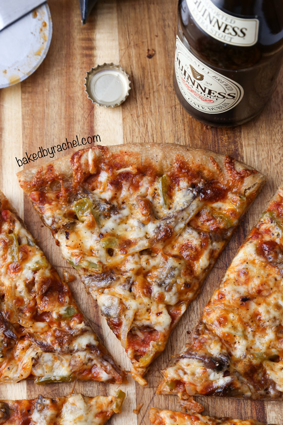 Thin crust Guinness pizza with beef, mushrooms and peppers. Recipe from @bakedbyrachel