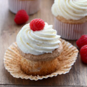 Moist angel food cupcakes with stabilized whipped cream frosting and fresh berries. Recipe from @bakedbyrachel