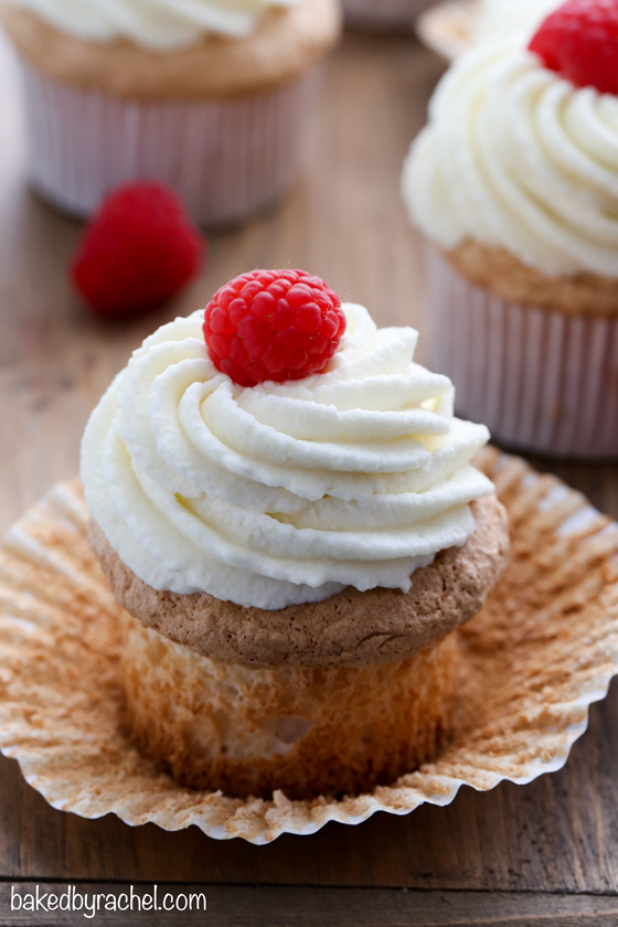 Moist angel food cupcakes with stabilized whipped cream frosting and fresh berries. Recipe from @bakedbyrachel