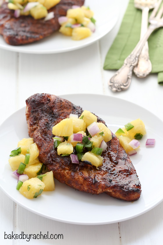 Moist and flavorful barbecue dry rubbed chicken with fresh pineapple salsa. Recipe from @bakedbyrachel