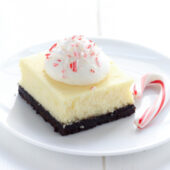 Creamy white chocolate peppermint cheesecake bars recipe from @bakedbyrachel