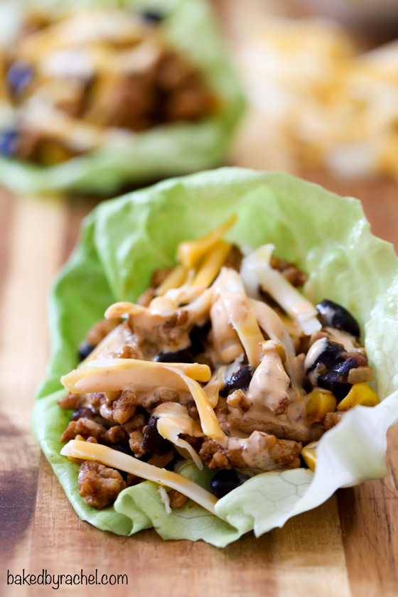 Chicken taco lettuce wraps with chipotle sour cream sauce recipe from @bakedbyrachel