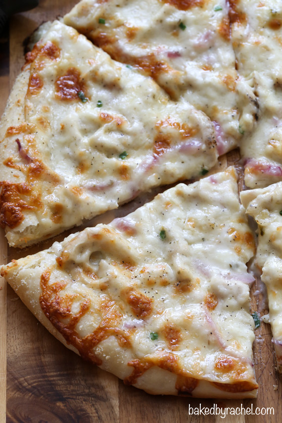 Thin crust three cheese chicken pizza with garlic white sauce recipe from @bakedbyrachel