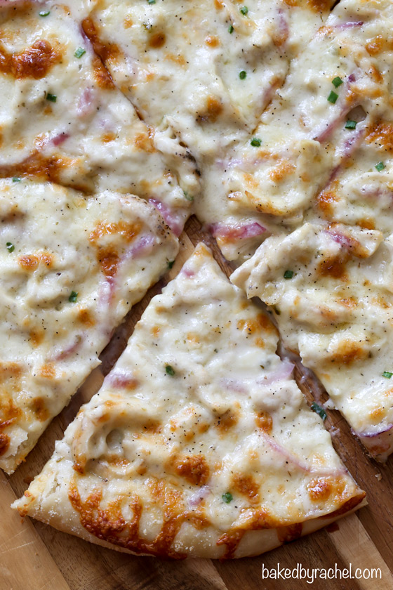 Thin crust three cheese chicken pizza with garlic white sauce recipe from @bakedbyrachel