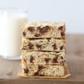 Soft and chewy oatmeal chocolate chip cookie bar recipe from @bakedbyrachel