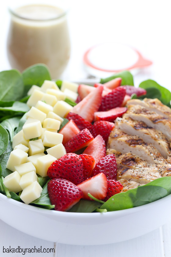 Strawberry spinach salad with grilled chicken and homemade vinaigrette. Recipe from @bakedbyrachel