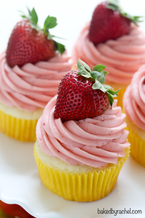 Moist strawberry lemonade cupcakes with lemon curd filling. Recipe from @bakedbyrachel