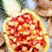 Strawberry pineapple salsa with cinnamon tortilla chips. Recipe from @bakedbyrachel A family friendly snack or appetizer!