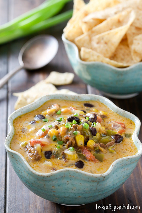 Flavor packed slow cooker cheesy beef nacho soup recipe from @bakedbyrachel