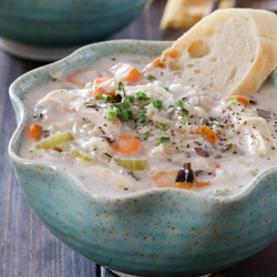 Creamy slow cooker chicken and wild rice soup recipe from @bakedbyrachel