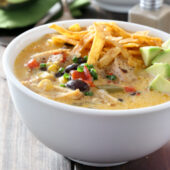 Cheesy slow cooker chicken fajita soup recipe from @bakedbyrachel