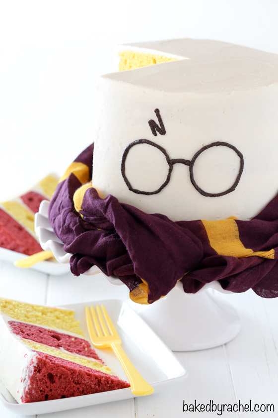 Harry Potter themed layer cake with fluffy vanilla buttercream frosting recipe from @bakedbyrachel. A fun birthday or celebration cake for any Harry Potter fan!