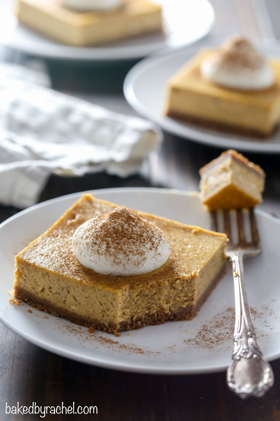 Creamy homemade pumpkin cheesecake bar recipe from @bakedbyrachel