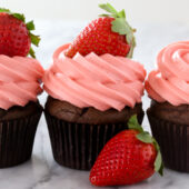 Chocolate cupcakes with strawberry cream cheese frosting recipe from @bakedbyrachel