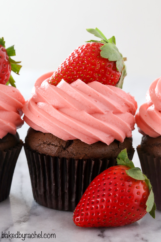 Chocolate cupcakes with strawberry cream cheese frosting recipe from @bakedbyrachel