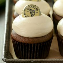 Moist homemade Guinness chocolate cupcakes with creamy Baileys brown sugar cream cheese frosting recipe from @bakedbyrachel A must make for St Patrick's day celebrations!