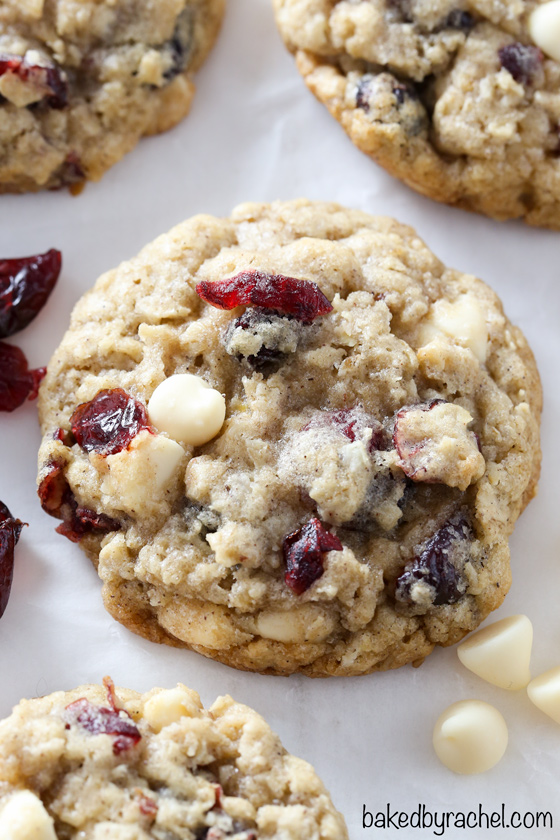 Soft and chewy cranberry white chocolate oatmeal cookie recipe from @bakedbyrachel A perfect treat for the holidays or any time of the year!