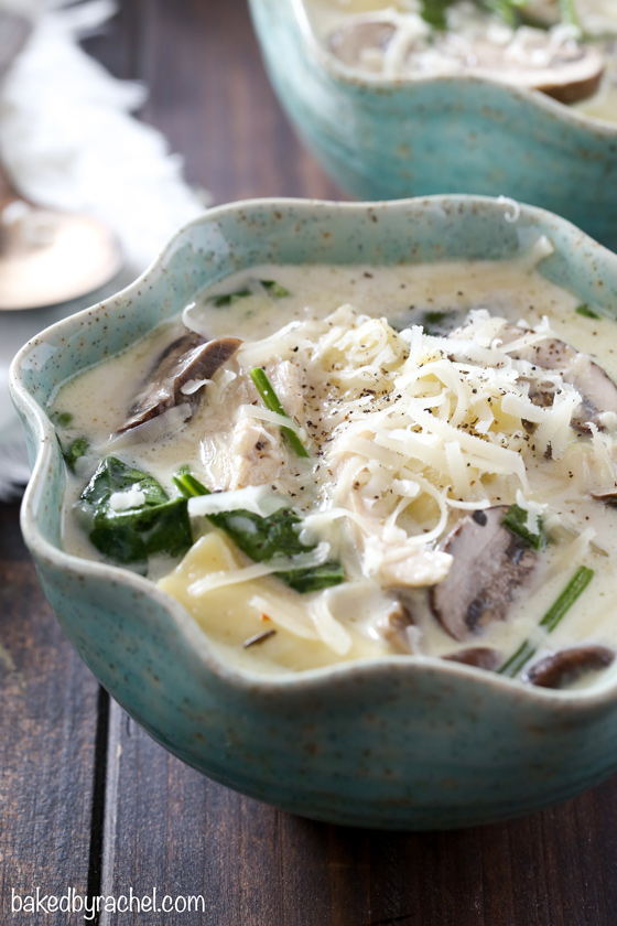 Easy and comforting slow cooker creamy white chicken lasagna soup with mushrooms and spinach recipe from @bakedbyrachel A perfect meal to warm up with all winter long!