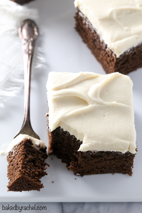 Moist and fluffy Guinness chocolate cake with silky brown sugar cream cheese frosting recipe from @bakedbyrachel A crowd pleasing dessert, perfect for St. Patrick's day or any day of the year!